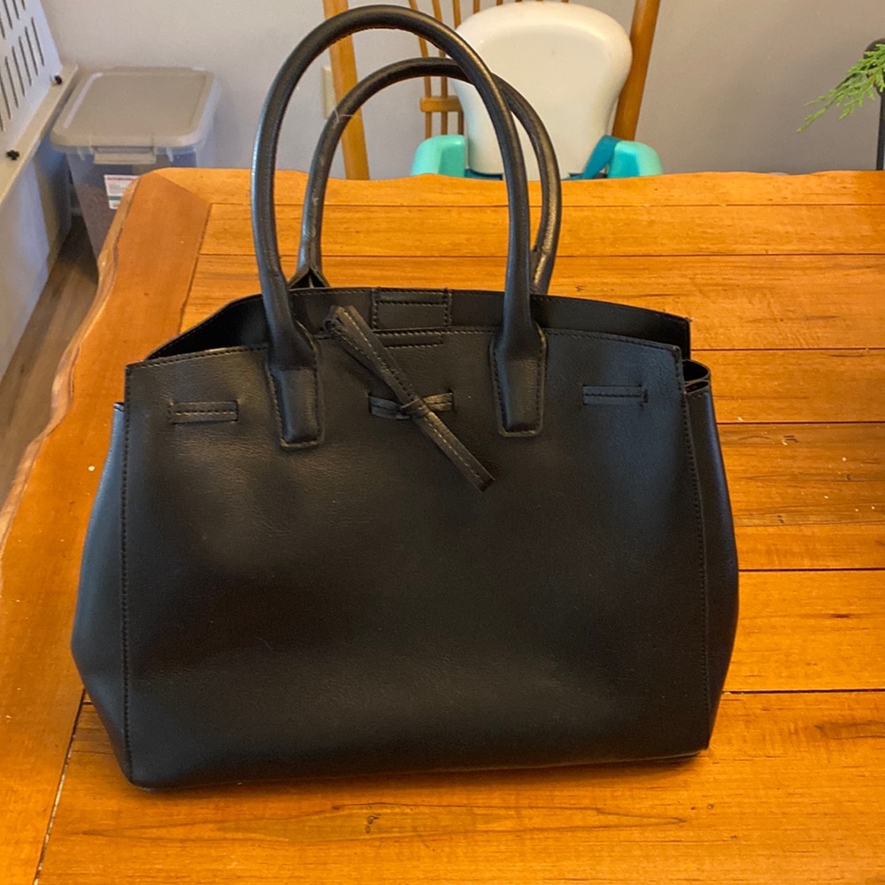 Sole society purse